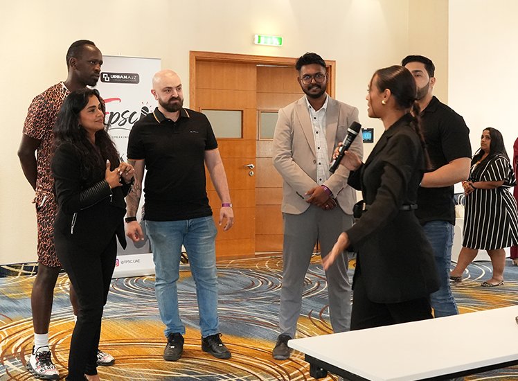 FPSC participant practising public speaking with a microphone